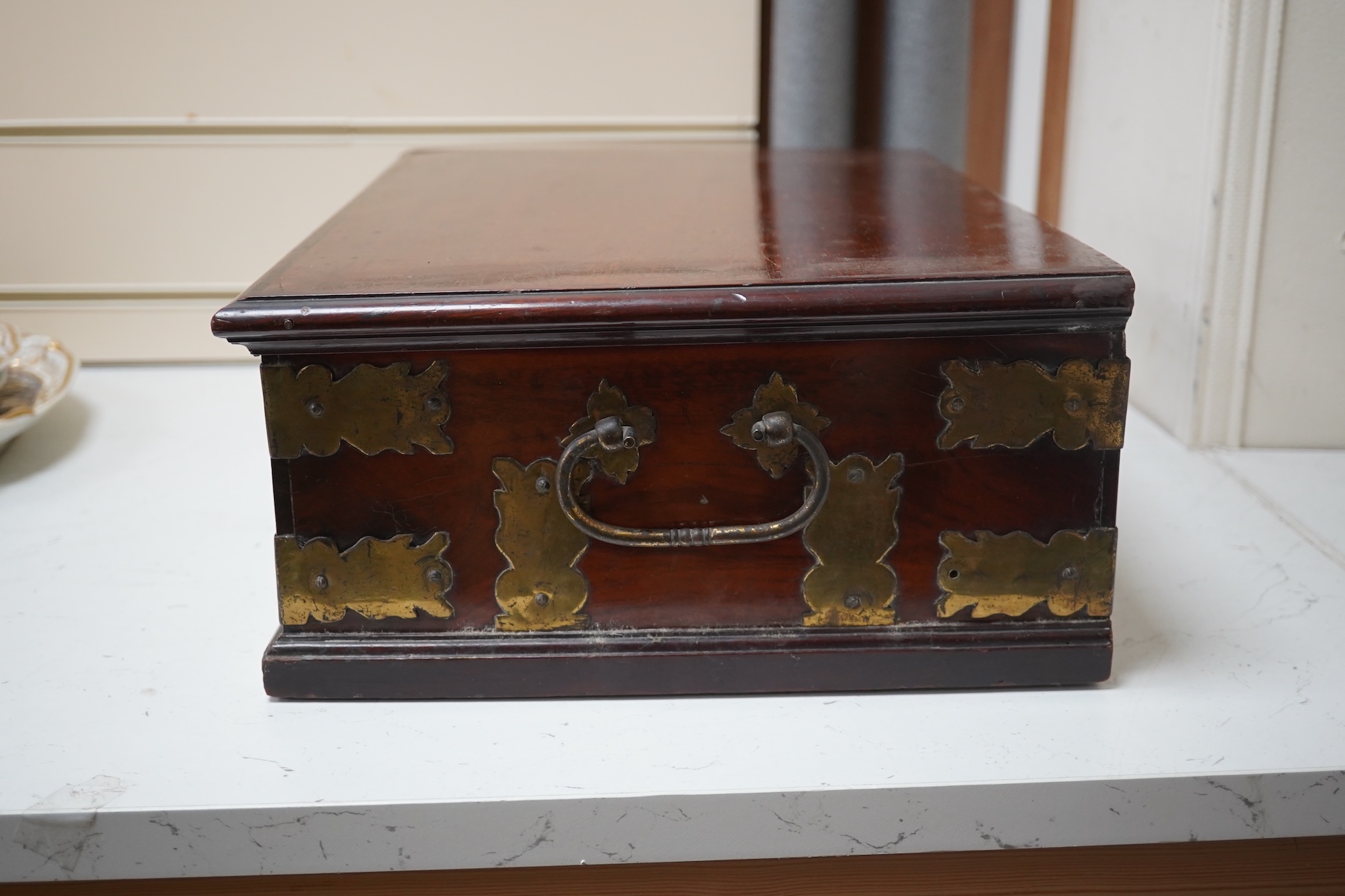 A late 18th century Indo-colonial brass mounted padouk wood casket, 43cm wide. Condition - good for age